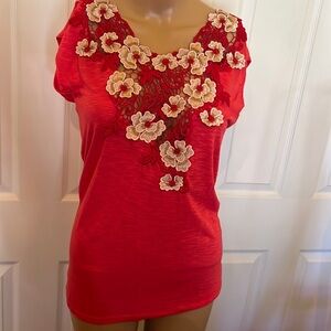 Orange cap sleeve shirt with see thru lace bodice and draped backS